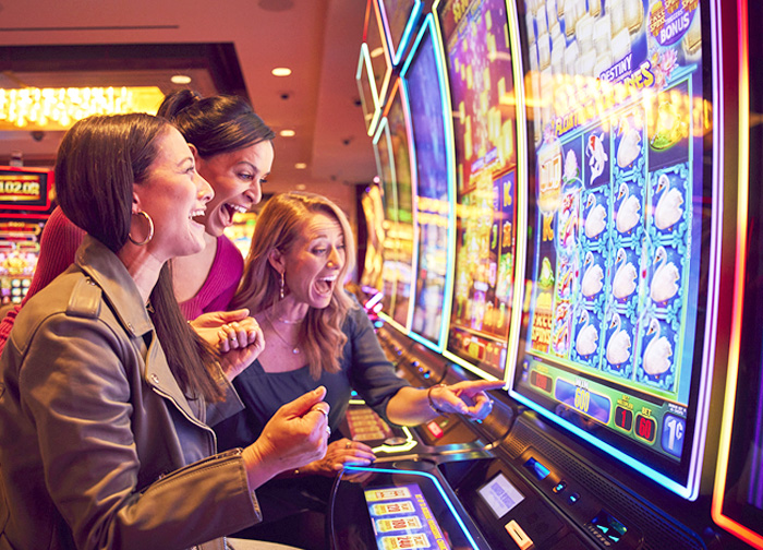 Girls Playing Slot Machines